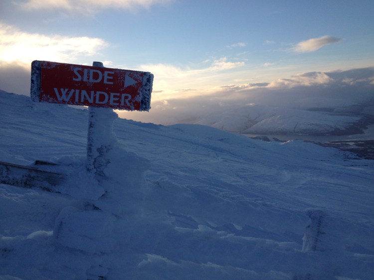 Wind-blown snow-covered fences, a sign that not every day up here is quite so calm